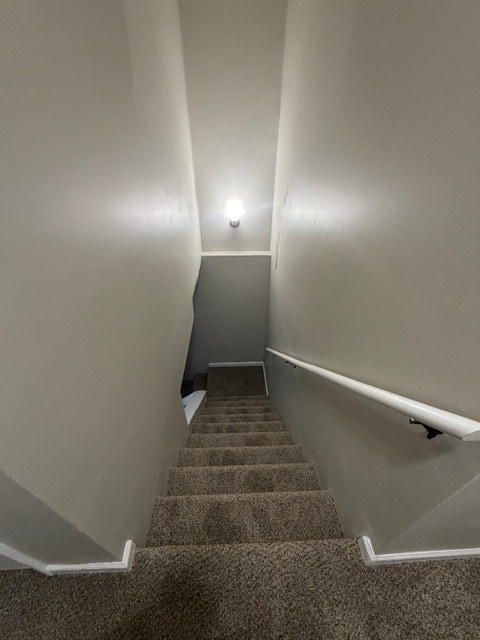 Stairs looking down to Living Room - 3203 Island Rd
