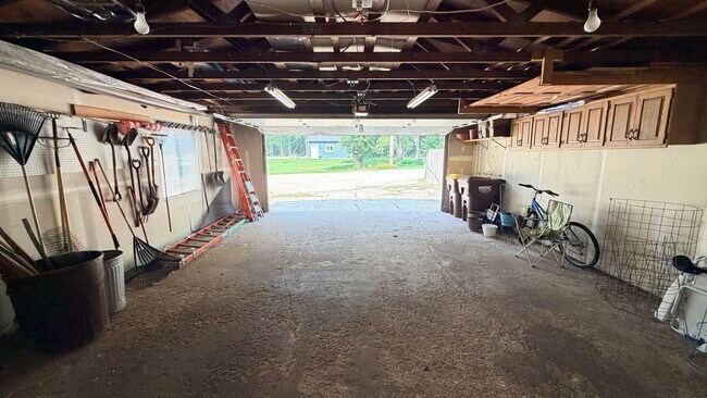 Building Photo - Riverfront Living on the Fox: 2 Bed, 1 Bath with Private Dock and Oversized Garage