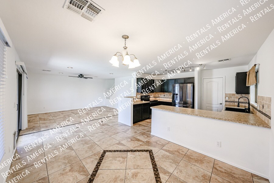 Building Photo - 13041 W Mauna Loa Ln