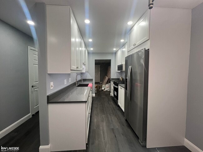 Building Photo - 4460 15 Mile Rd