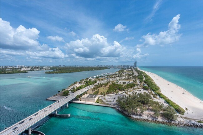 Building Photo - 10295 Collins Ave