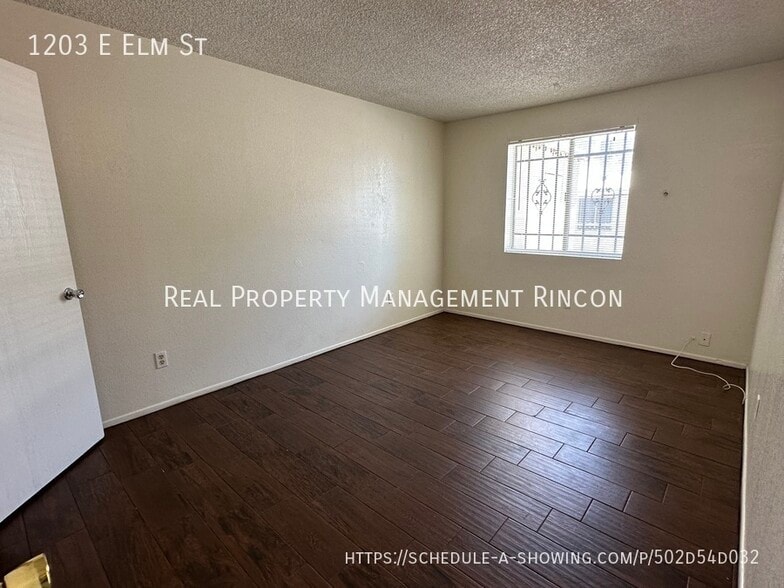 Building Photo - 1203 E Elm St