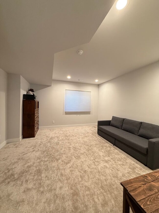 Building Photo - Stunning Luxury Living in Coal Creek with ...
