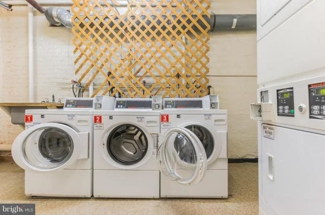 Laundry room with washers and dryers in building- conveniently accepts both credit cards and coins - 3719 12th St NE