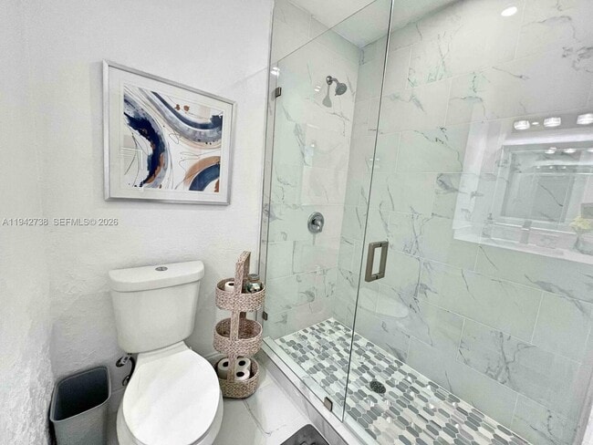 Building Photo - 5249 NE 3rd Ter.