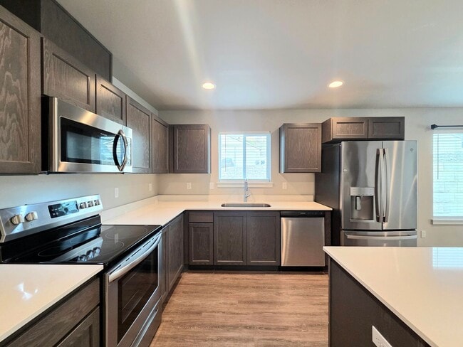 Building Photo - Modern 3 Bed / 2 Bath Rambler | Fully Fenced Yard + 2-Car Garage | Newer Neighborhood