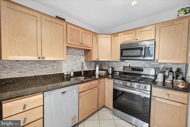 Building Photo - 5225 Pooks Hill Rd