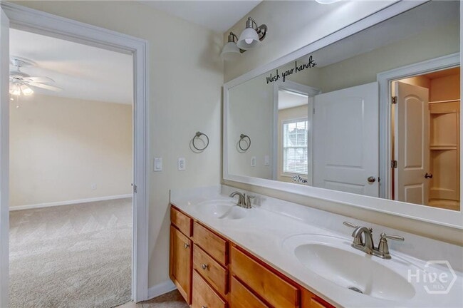 Building Photo - "Spacious 5-Bedroom, 4.5 Bath Retreat at Westbrook Cove at Savannah Quarters!"