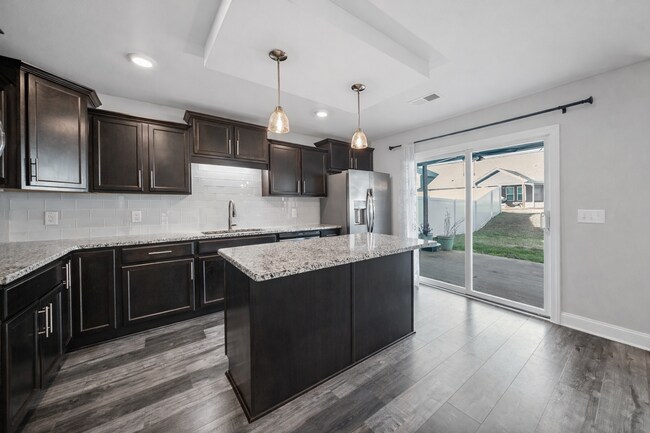 Building Photo - Pet Friendly Three Bedroom!