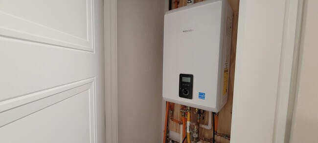 Building Photo - Large 2bd/2bath with Garage parking! Steps to Commuter Rail!