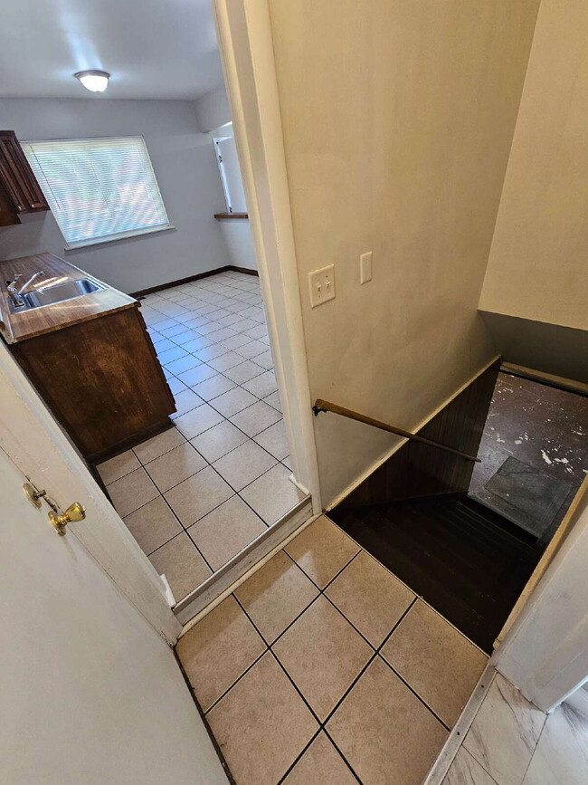 Building Photo - 3-Bedroom Brick Ranch, Hardwood Floors, Large Kitchen, Big Basement & 2-Car Garage