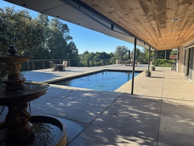 Building Photo - Stunning Deck and Pool for this Updated Mi...