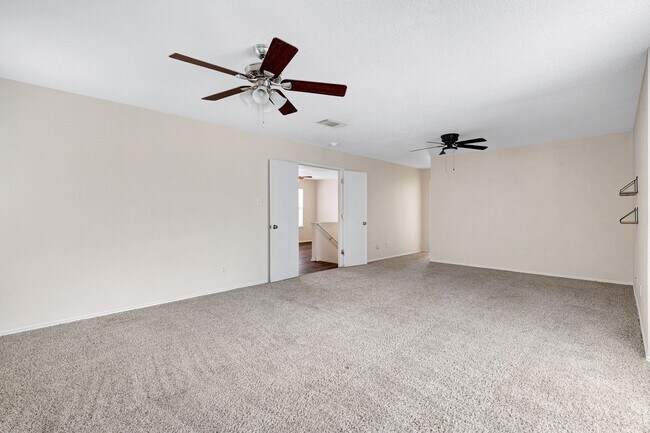 Building Photo - Spacious Brick-Front Home with Loft and Ex...