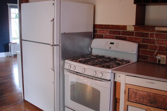 Kitchen with Refrigerator and Gas Stove - 3402 N 28th St