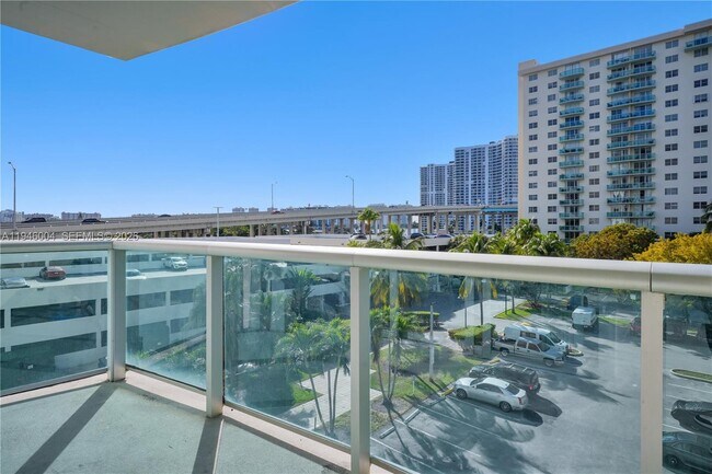 Building Photo - 19380 Collins Ave