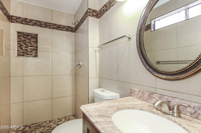 Building Photo - 6410 W Sandra Terrace