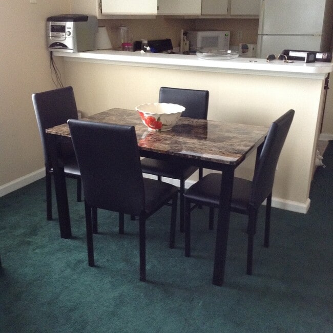Building Photo - SPECIAL!  Fully Furnished 2 Bedroom Condo in River Oaks; 1/2 off rent second month