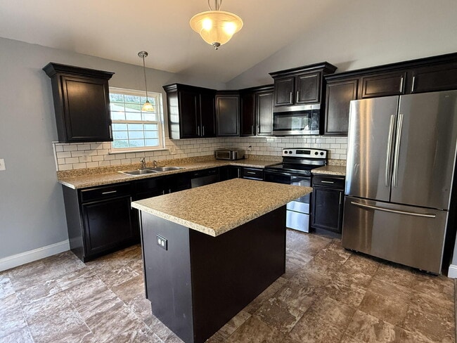 Building Photo - Wonderfully updated split foyer homes loca...