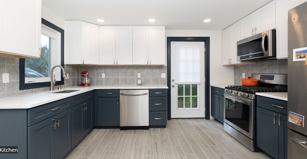 Modern kitchen with modern appliances including a dishwasher - 8 Alveston St