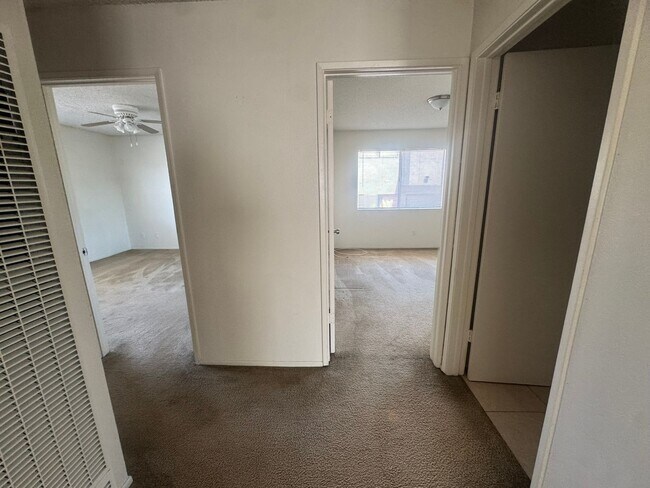 Building Photo - $2,395! Spacious Upstairs 2 Bedroom, 2 Bathroom Apartment with 2-Car Garage! 90710
