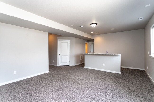 Building Photo - Spacious 5-Bedroom Home with Finished Base...