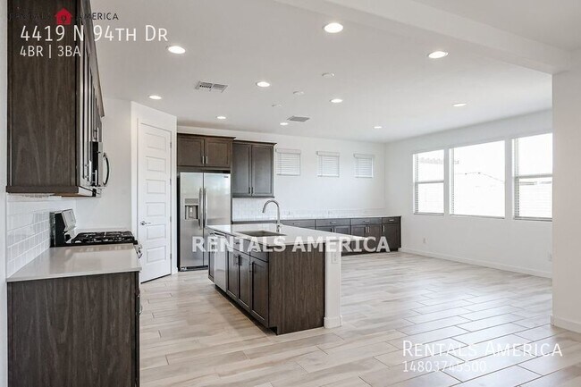 Building Photo - Gorgeous Open-Concept 4-Bedroom Home in a ...