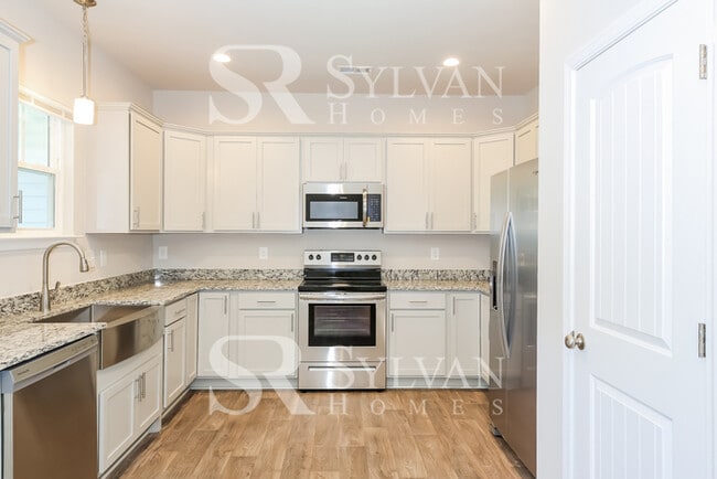 Building Photo - Enjoy living the good life in this 3 bedroom, 2.5 bathroom townhome