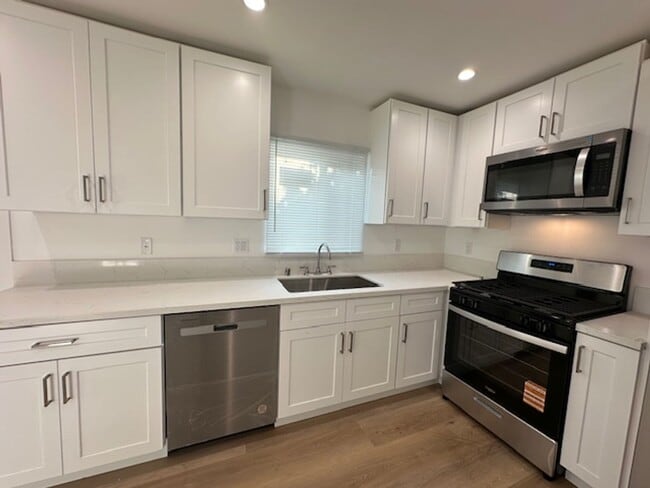Building Photo - Completely remodeled and located on a quie...