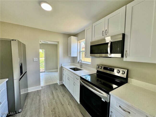 Building Photo - 531 99th Ave N