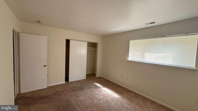 Building Photo - 8103 Greenspring Way