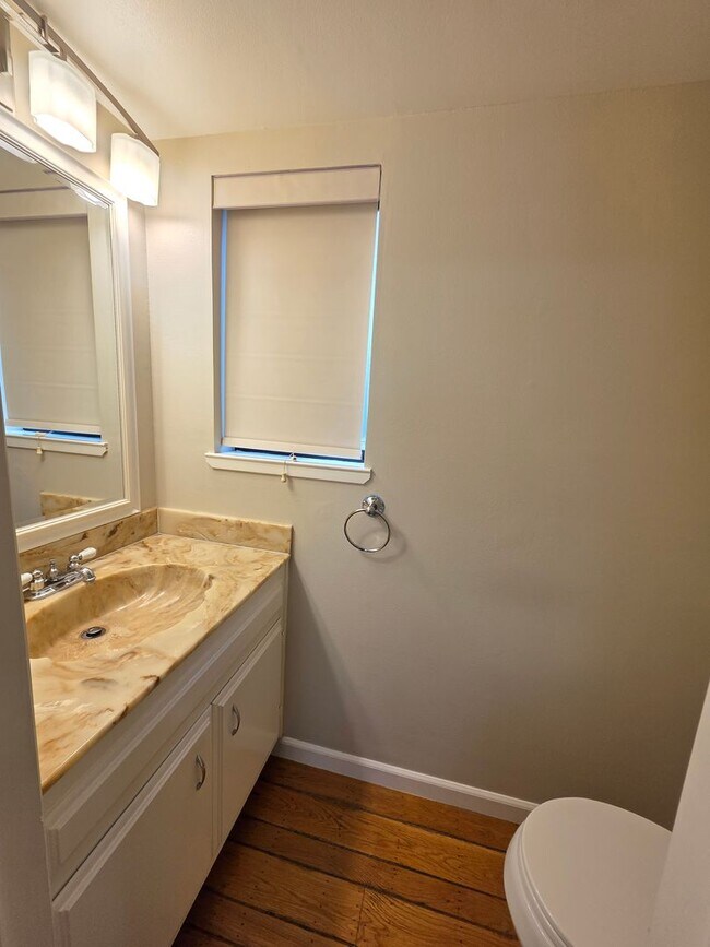 Building Photo - Spacious 2BR Condo with Central A/C, Bonus Room & Huge Storage – Walk to Burlingame Avenue
