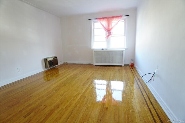 Building Photo - 64-12 48th Ave