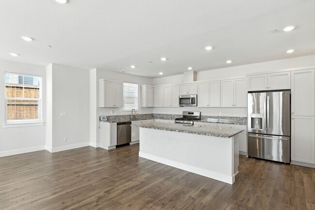 Building Photo - Spacious 4-Bedroom Home, Plus Den/Office with Modern Upgrades and Great Amenities
