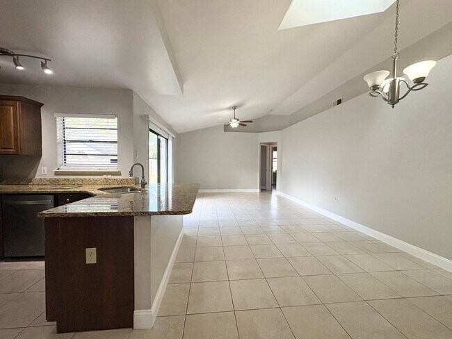 Building Photo - 4B/2B Home in Oviedo ~ Carpet Free ~ Top Rated Schools