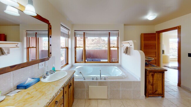 Building Photo - Custom Adobe style home in exclusive Navaj...