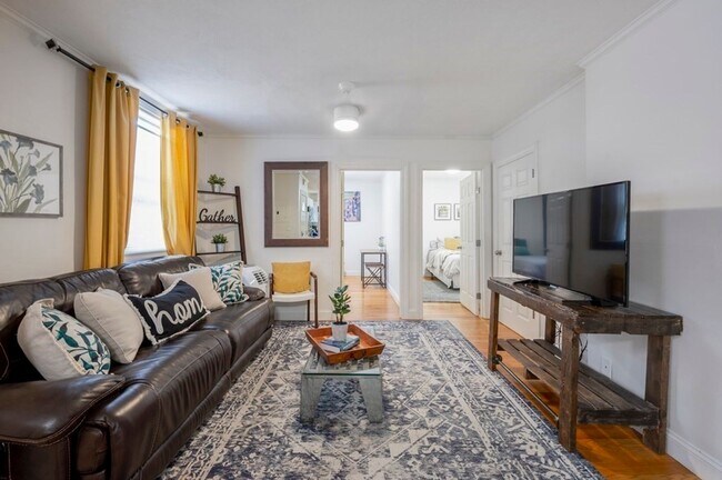 Building Photo - Spacious and updated 3-bedroom condo just 2 blocks from Airport T Station!