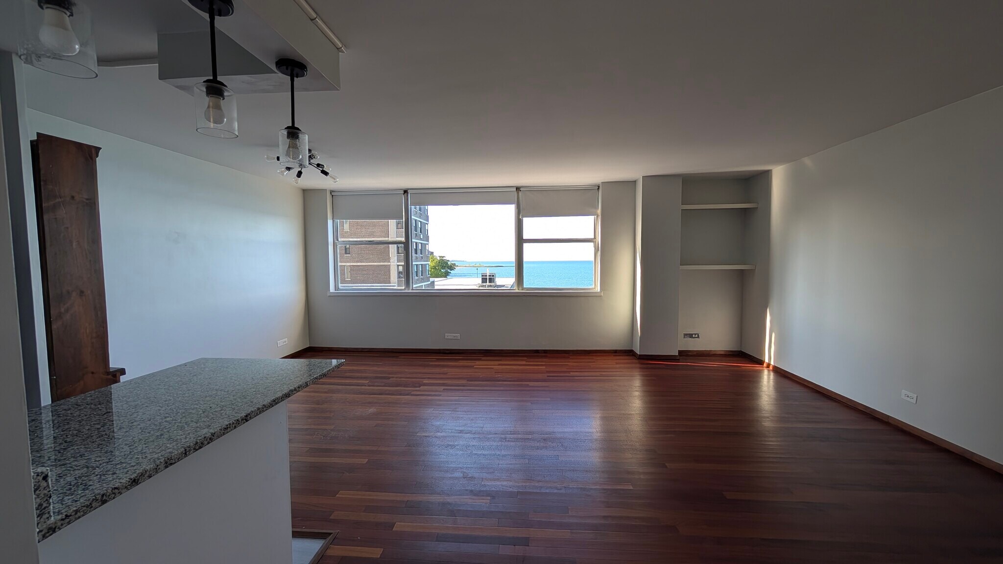 Living and dining space facing North - 6301 N Sheridan Rd