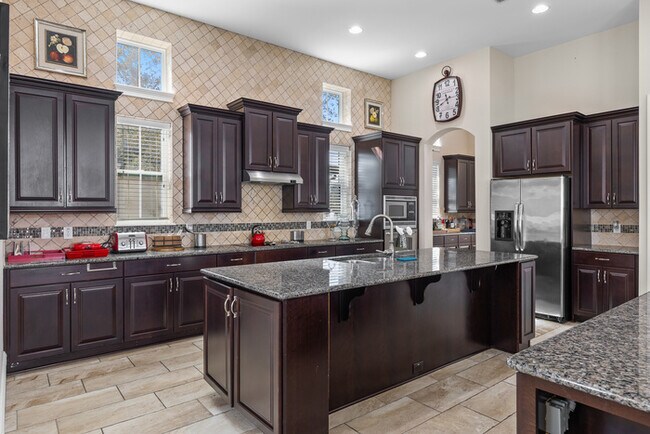 Building Photo - Luxury Waterfront Pool Home in Laureate Park | 4BR + Water Views