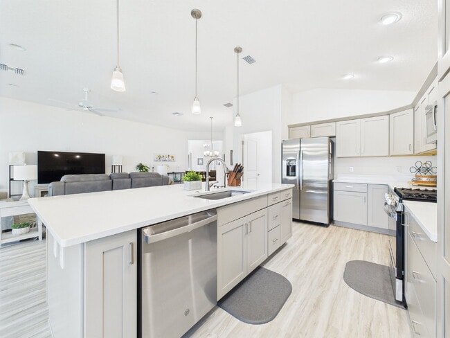 Building Photo - Furnished 3/2 in Water’s Edge | Golf Cart ...