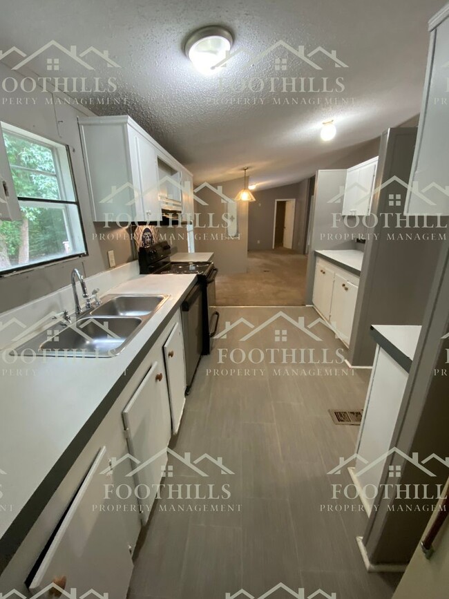 Building Photo - Spacious 4-Bedroom Double-Wide Mobile Home...