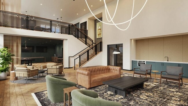 Two-story rooftop lounge with gathering space and demonstration kitchen at Modera Shoreline apartments near Seattle, WA. - Modera Shoreline