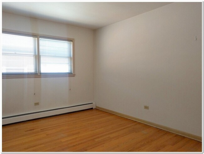 Building Photo - 8406 W Berwyn Ave