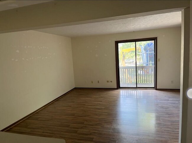 Facing out from kitchen into living room - 506 State Mill Rd