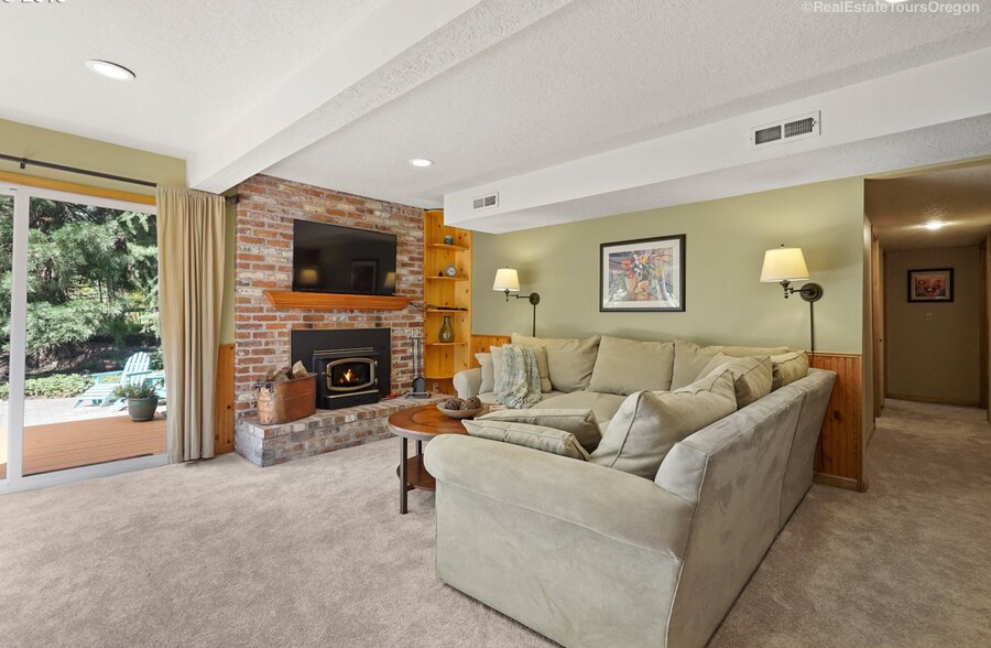 Lower family room fireplace - 4625 SW 42nd Pl