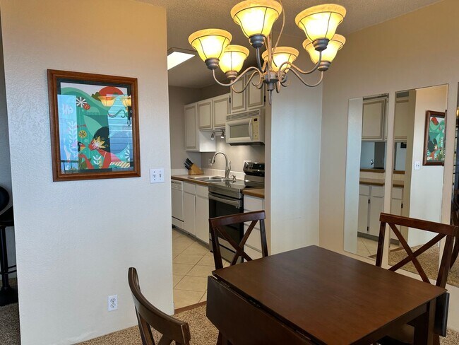 Building Photo - Furnished 2 bedroom 2 bath condo 2 assigned parking stalls