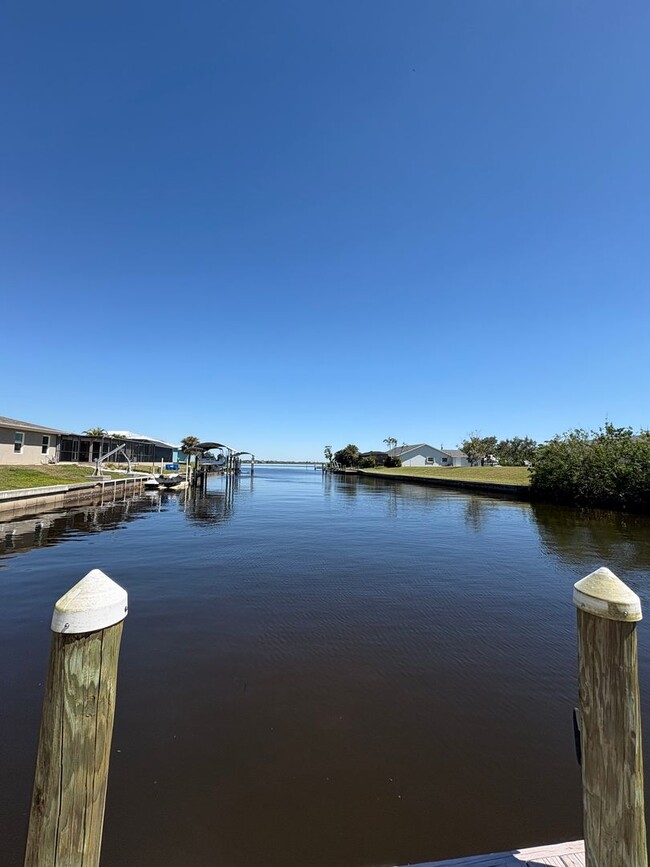 Building Photo - Sunsets & Serenity 2/2 Pool Home on a canal