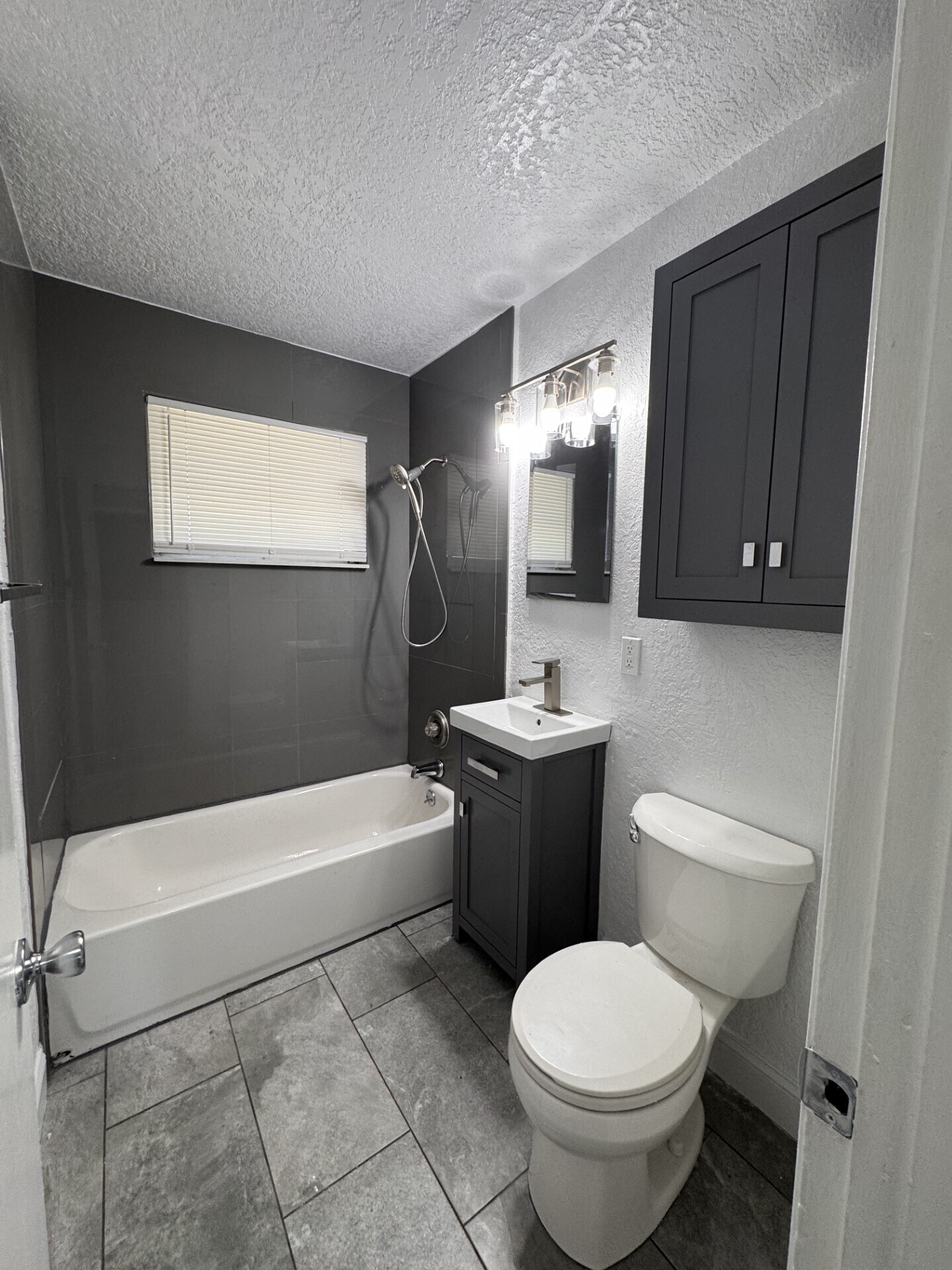 Bathtub, toilet, sink, mirror, tile, etc) - 128 NW 13th Avenue