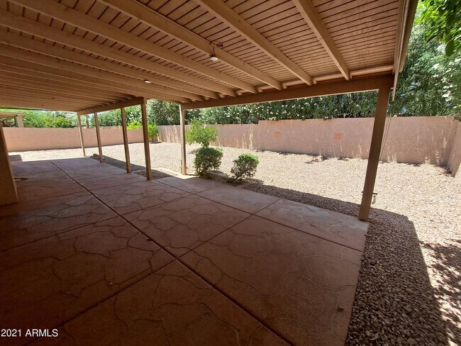 Building Photo - 9074 E Caribbean Ln