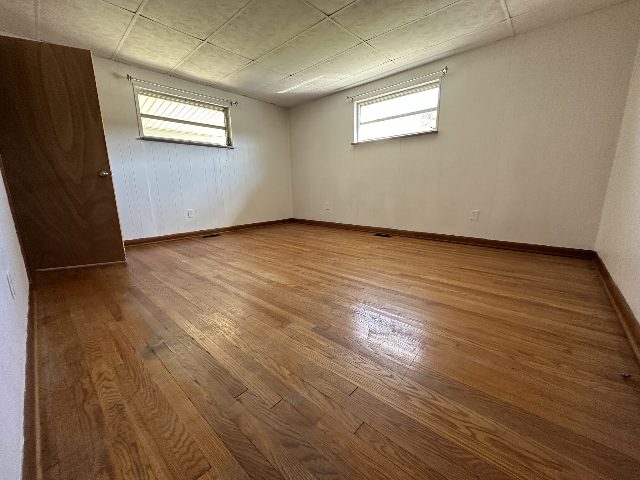 Larger front bedroom (originally two bedroom when built) - 6120 Pinedale Dr