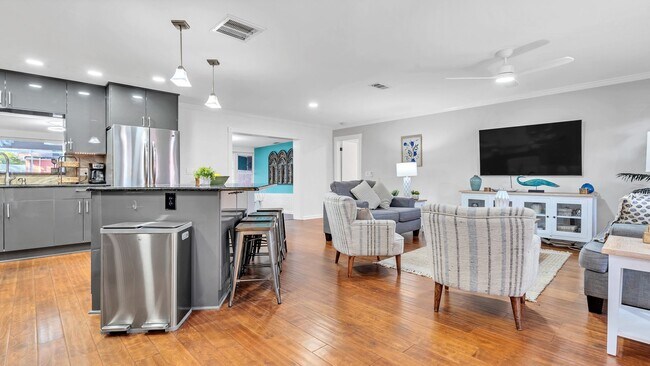 Building Photo - Luxurious FURNISHED 4BR/3BA Pool Home with...